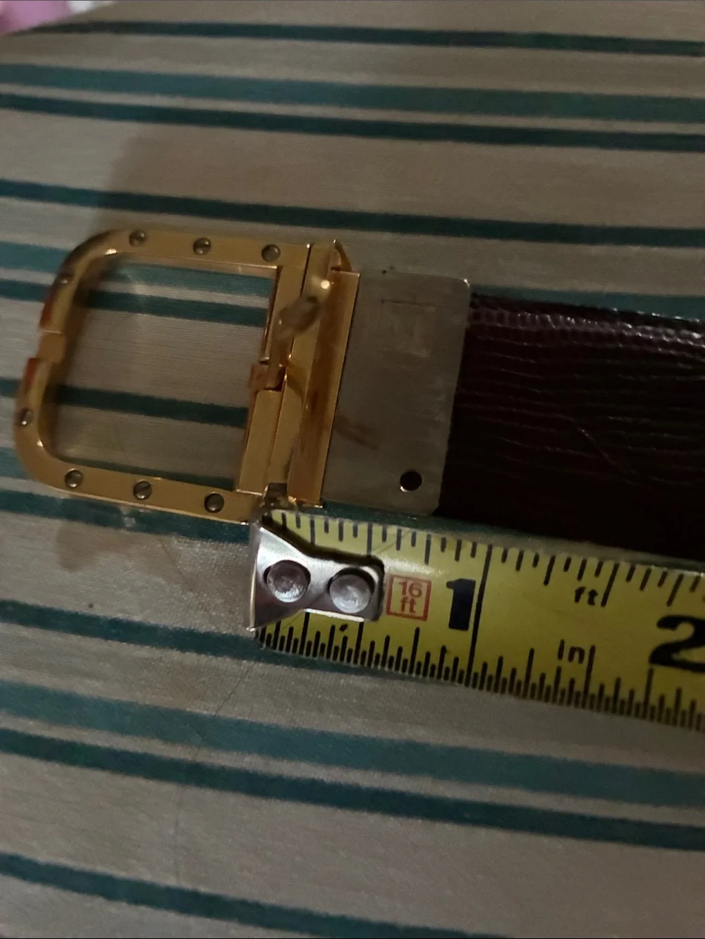 Bruno Magali brown/ black snakeskin leather reversible belt. Brass buckle. L40”